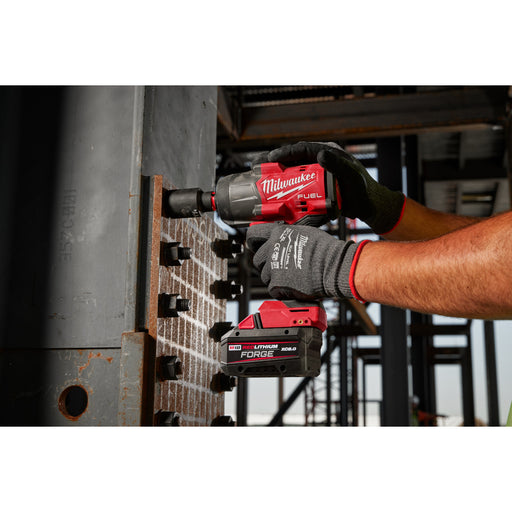 Photo of a person using M18 FUEL™ 1/2"
High Torque Impact
Wrench w/ Friction Ring
(Tool Only) (296720BIN) on the job site
